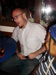 Ed prepares to show us his other tattoo, "Spot".